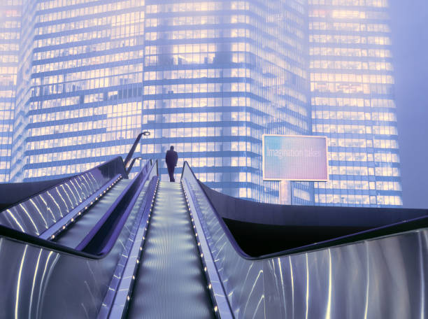 person on a exterior escalator going to building