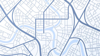 Stylized city map with blue roads and waterways intersecting over a light grid.