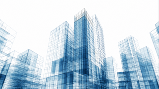Blue-tinted glass skyscrapers forming a modern city skyline. (informative image)