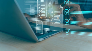 Digital checklists and UI overlays projected from a laptop, suggesting automated task tracking or compliance checks.